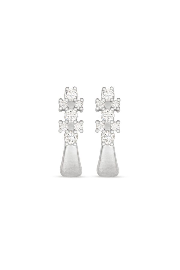 Pair of Dubose Drop Studs in 18k white gold with prong-set diamonds tapering into a brushed blade.